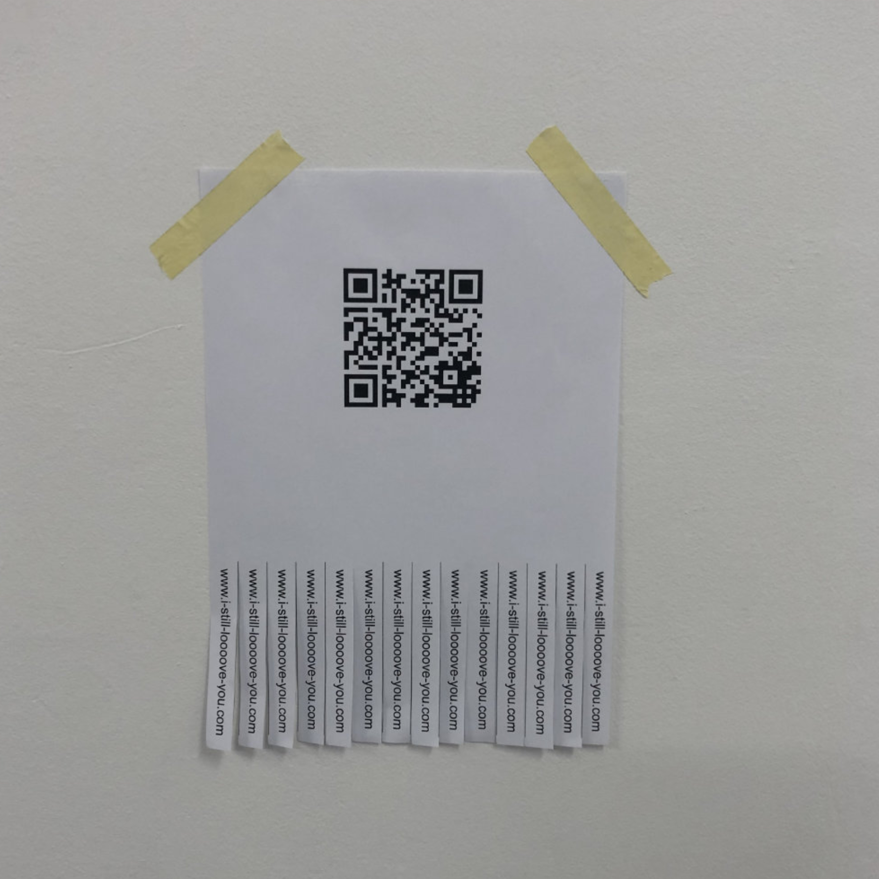 a A4 paper taped on the wall